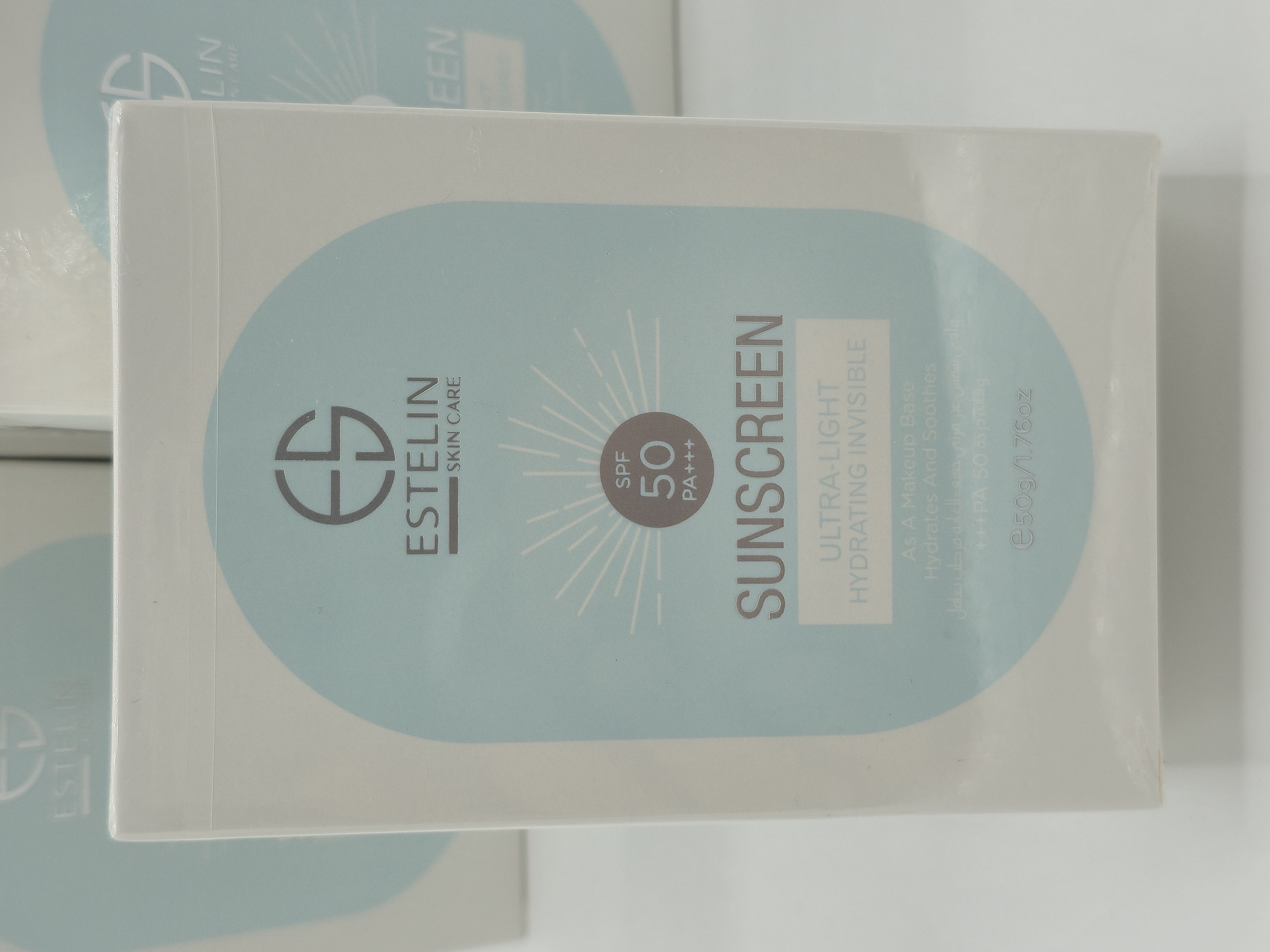 کرم ضد آفتاب بدون رنگ استلین، 50 SPF، مدل ultra light، مناسب انواع پوست و حجم 50 میل